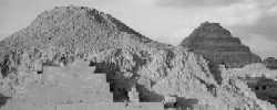 The rubble core of Unas's pyramid, with Djoser's Step Pyramid in the background