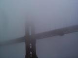 [Fog-shrouded photo of the Golden Gate Bridge]