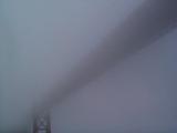 [Fog-shrouded photo of the Golden Gate Bridge]