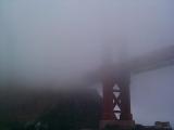 [Fog-shrouded photo of the Golden Gate Bridge]